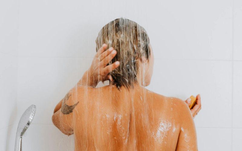 How to Deep Clean a Showerhead With Vinegar and Baking Soda to Restore Full Water Pressure